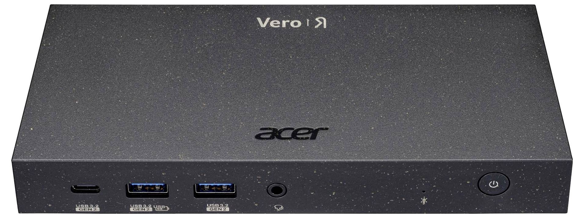 Een rechthoekig Acer Vero-apparaat met meerdere poorten aan de voorkant, waaronder USB- en audio-aansluitingen, evenals een netschakelaar.