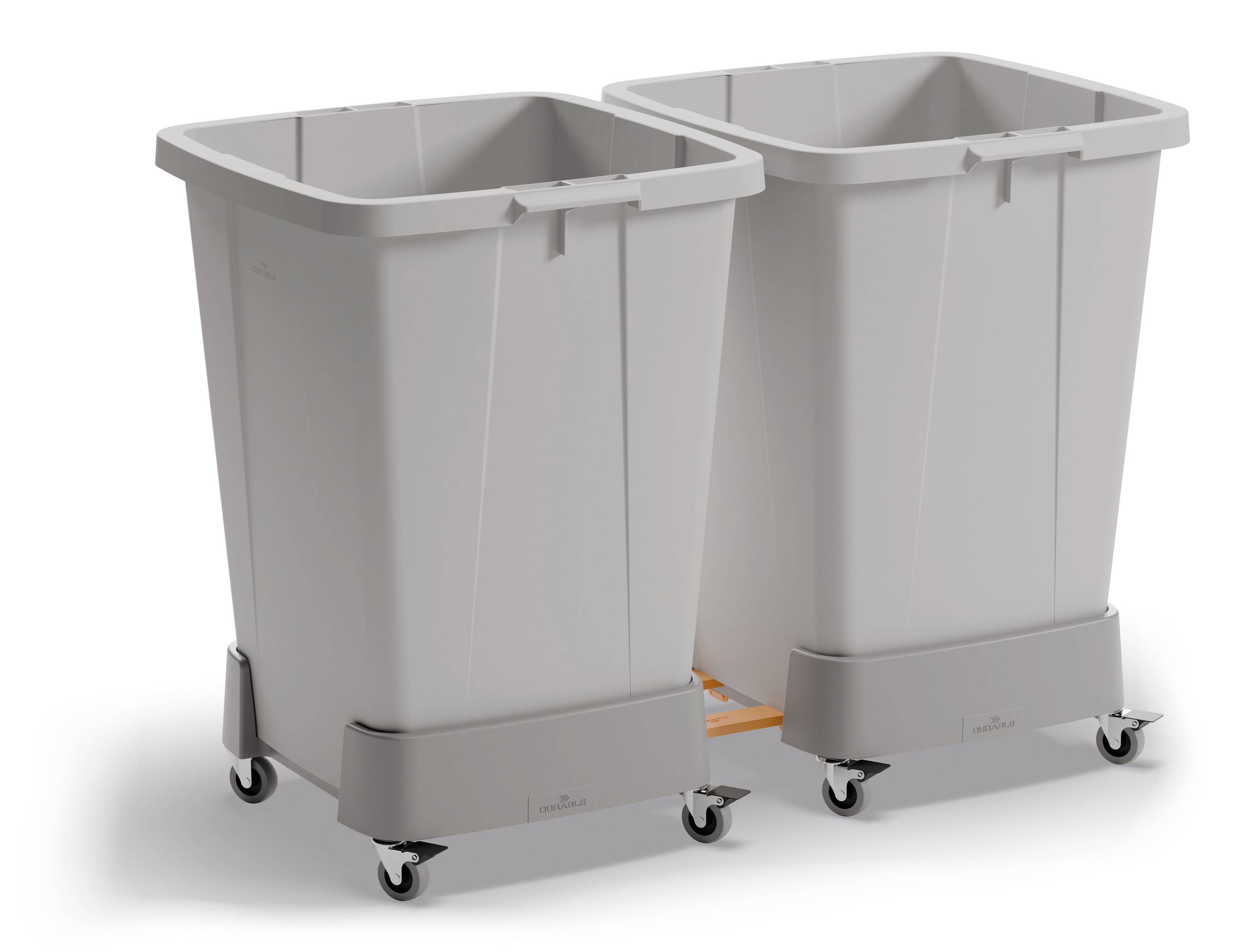 Twee grijze vuilcontainers met wielen op een witte achtergrond. Ze staan dicht bij elkaar en lijken geschikt voor commercieel gebruik.