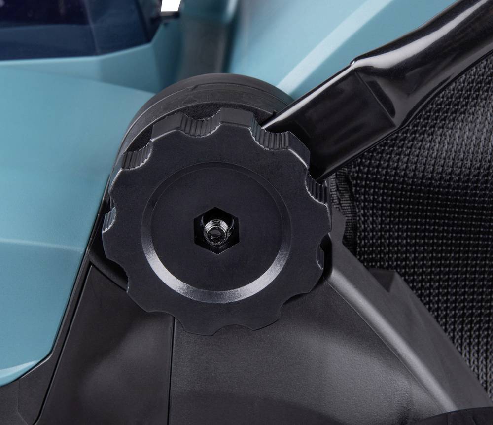 Close-up van een verstelbare draaiknop op een modern technisch apparaat, mogelijk voor het aanpassen van functies of spanning.