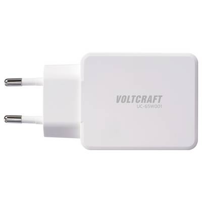 Een witte stekkeradapter met het label 'Voltcraft UC-65W001' voorzien van twee metalen pinnen voor een elektrische contactdoos.