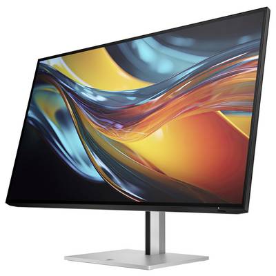 Een moderne monitor vertoont een abstract, kleurrijk digitaal kunstwerk met sierlijke lijnen in blauw, rood en geel.