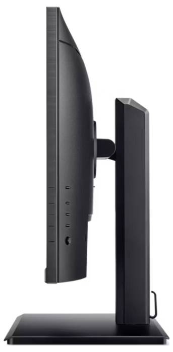 Een computermonitor van opzij gezien, met een zwarte behuizing, geplaatst op een rechthoekige voet.