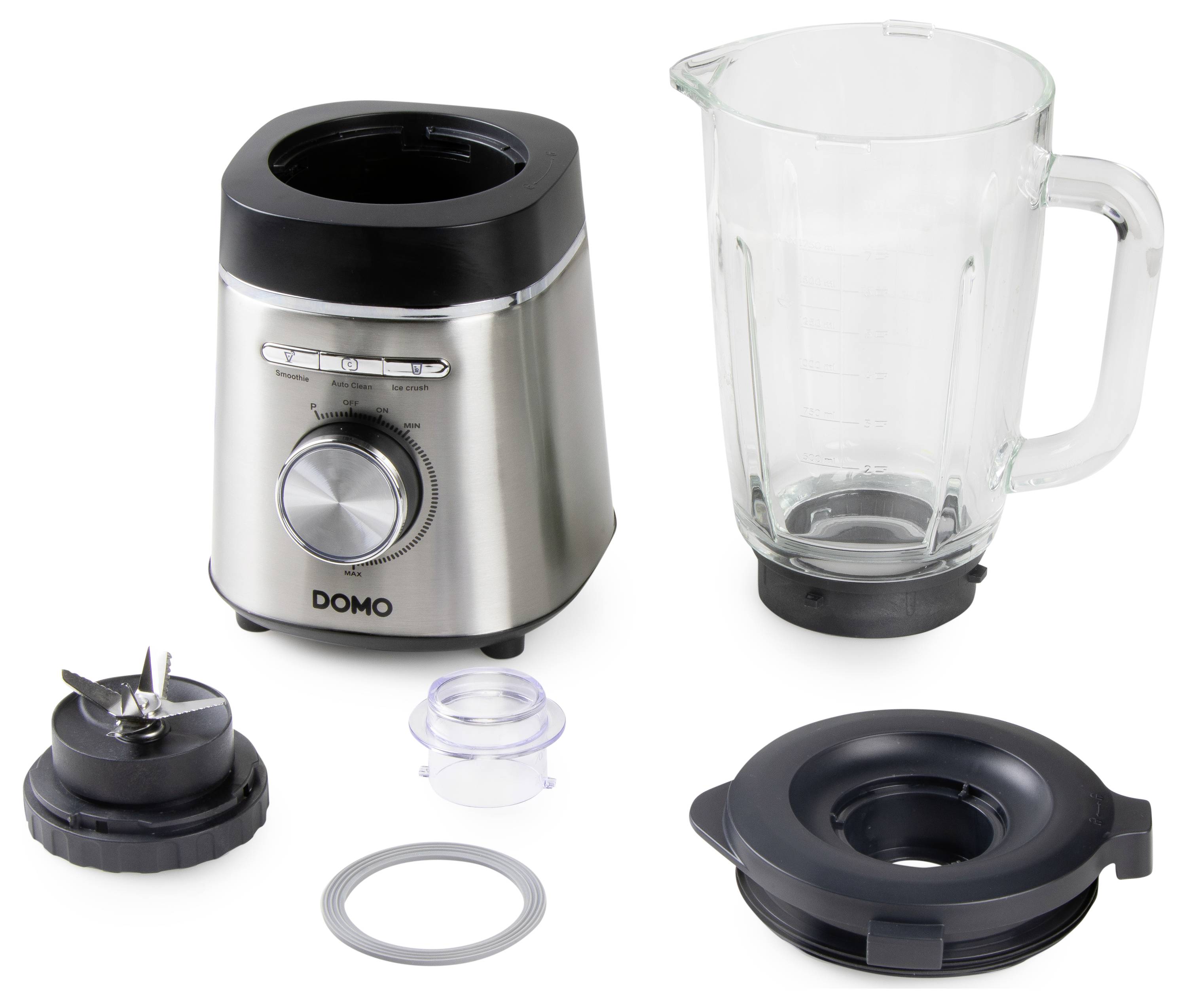 Een mixer in onderdelen: basis met draaiknop, glazen kan met handvat, verwijderbaar mes, afdichting en deksel met vultrechter.