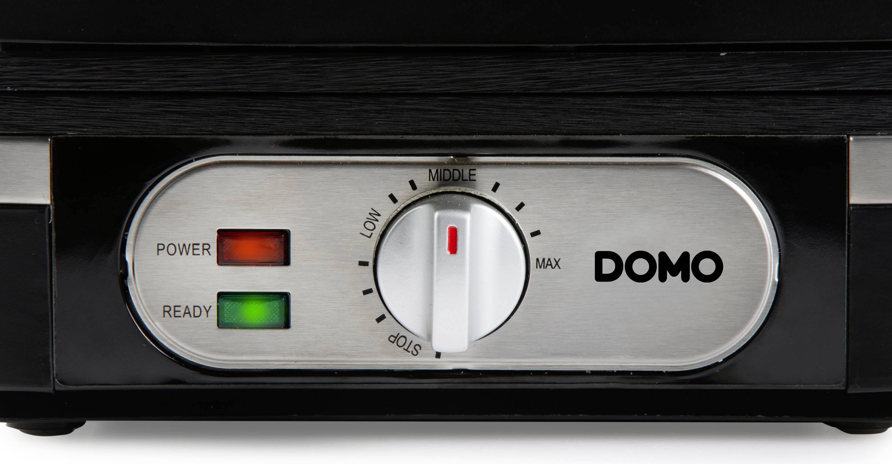 Close-up van een apparaatbedieningspaneel met twee controlelampjes voor 'Power' en 'Ready' in respectievelijk rood en groen. Draaiknop voor temperatuurinstelling.