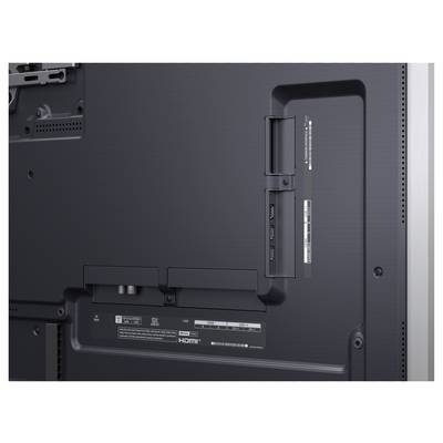 Achteraanzicht van een flatscreen tv met HDMI-poorten en andere aansluitingen.