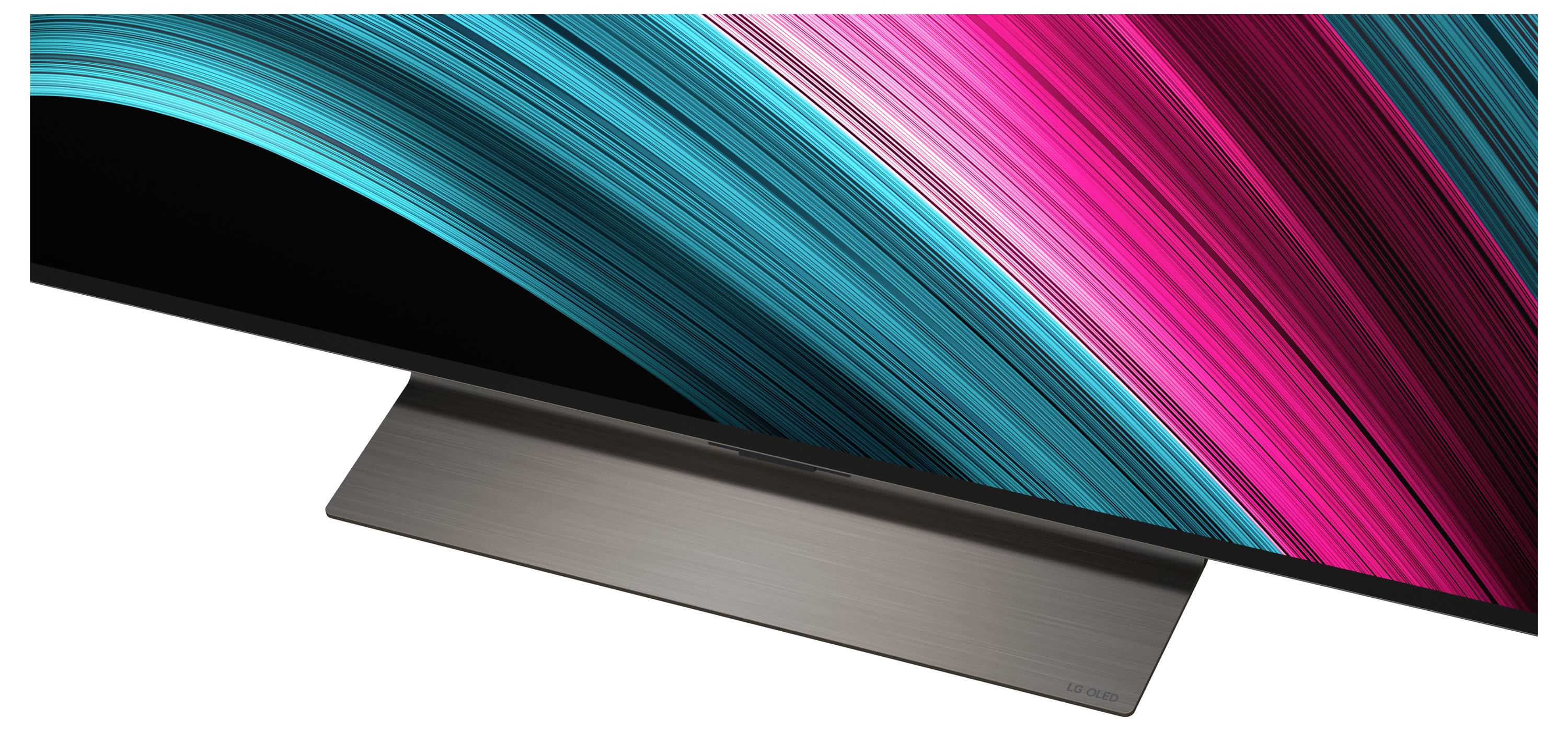 Een flatscreen-televisie met een strak, hoekig design vertoont levendige turkooise en roze diagonale lichtpatronen over het scherm.