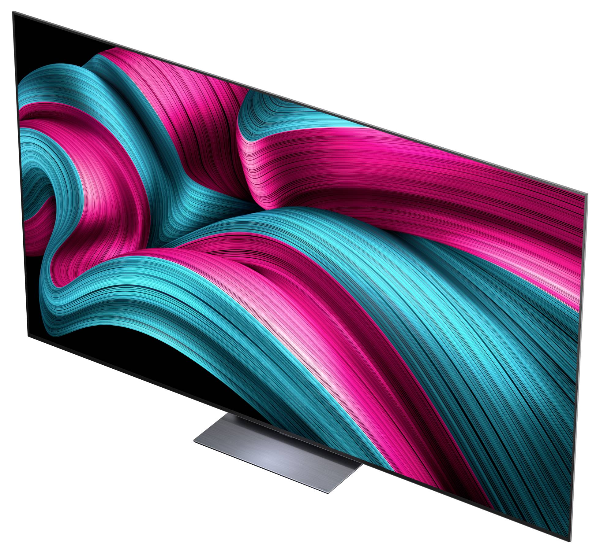 Een groot, smal televisiebeeldscherm dat levendige, abstracte roze en groenblauw wervelende patronen op een zwarte achtergrond vertoont.