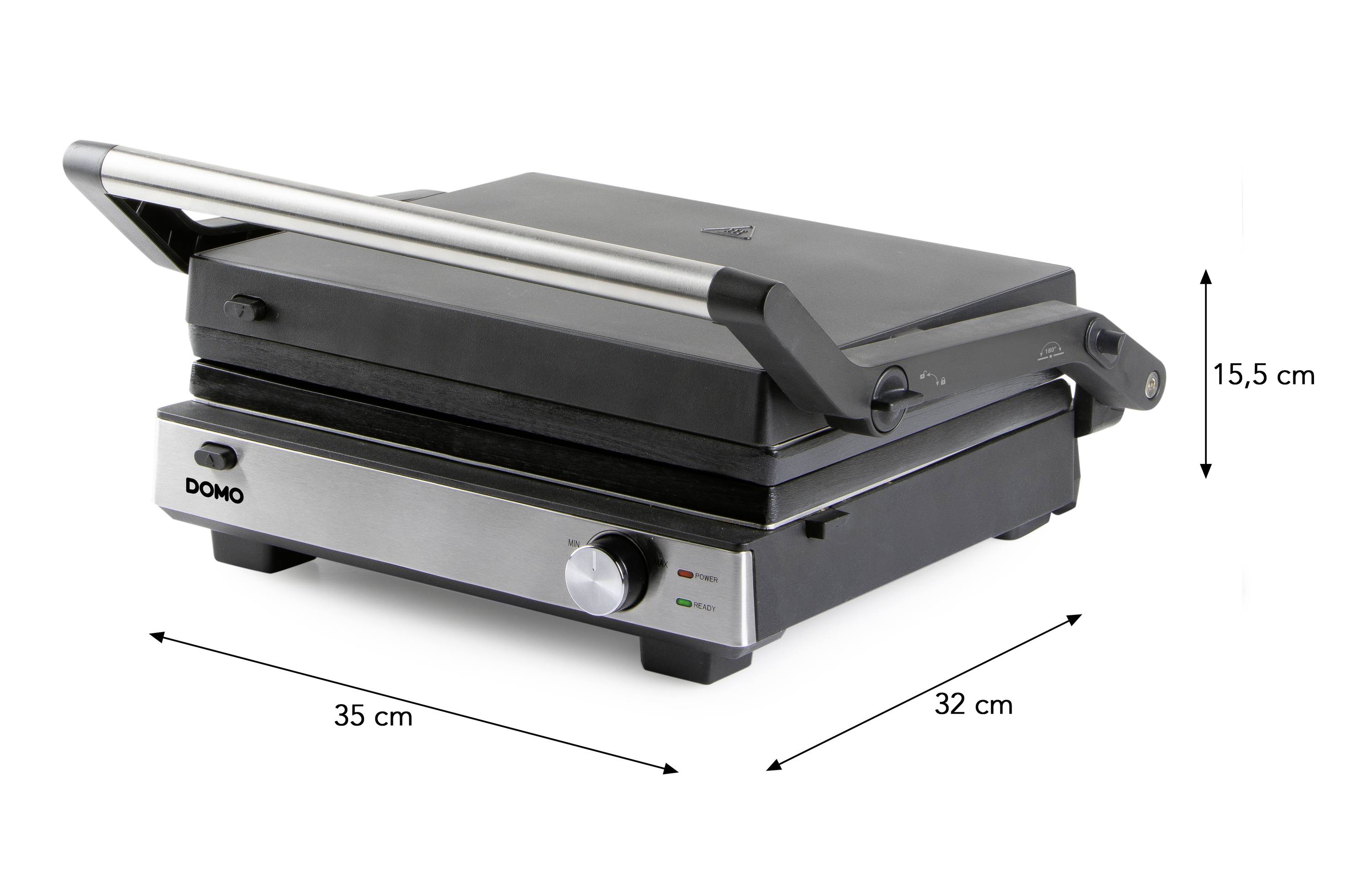 Elektrische tafelgrill in gesloten toestand, zilver met zwarte deksel en handgreep, afmetingen: 35 cm breed, 32 cm diep, 15,5 cm hoog.