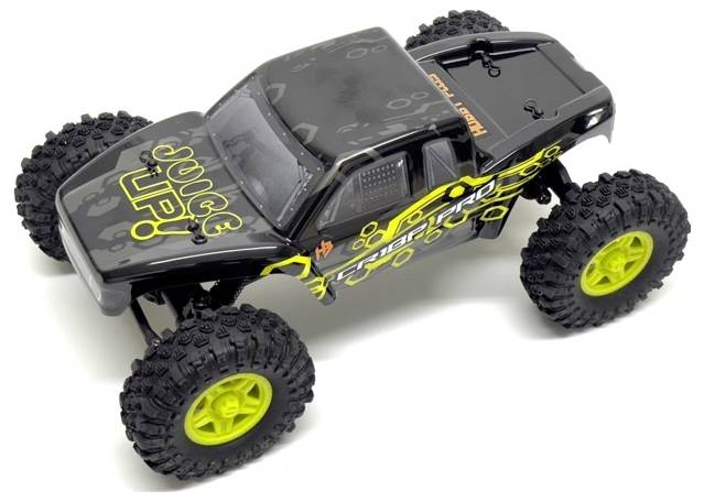 Een zwart-geel bestuurbare auto met grote, stevige banden. Opschrift op de motorkap: 'Juice Up!'.