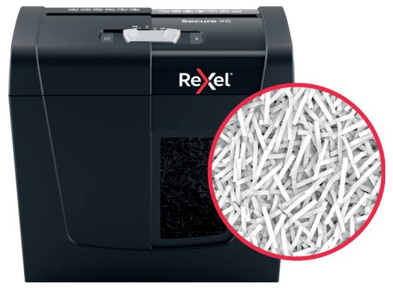 Papiervernietiger van Rexel met versnipperd papier op de voorgrond.