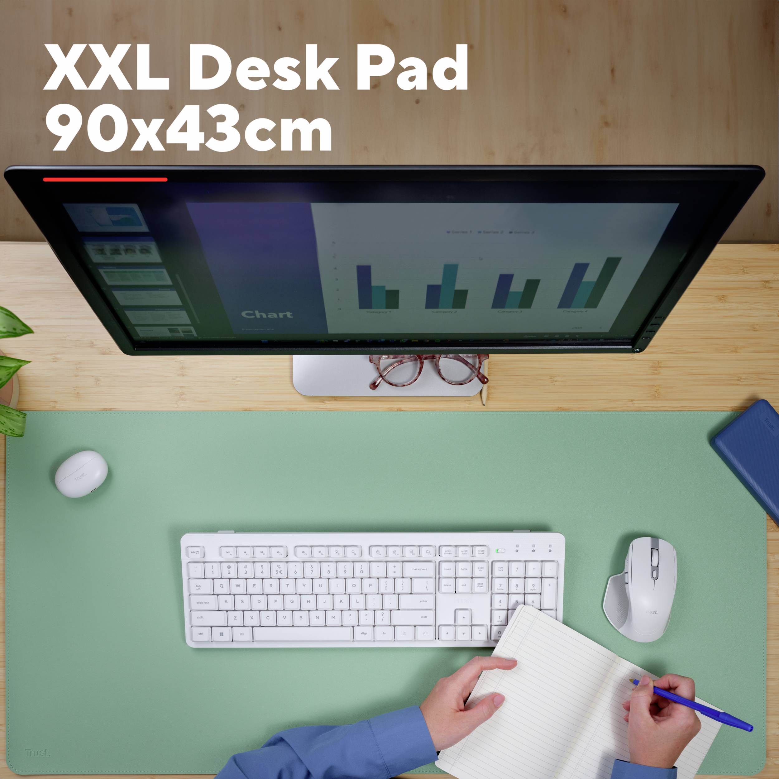 XXL-bureauonderlegger in groen, afmetingen 90x43 cm. Afgebeeld op een bureau met monitor, toetsenbord en notities eronder.