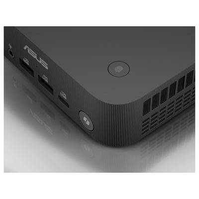 Een zwarte ASUS mini-pc met bedrijfslogo, USB-poorten en ventilatiesleuven, op een reflecterende oppervlakte.