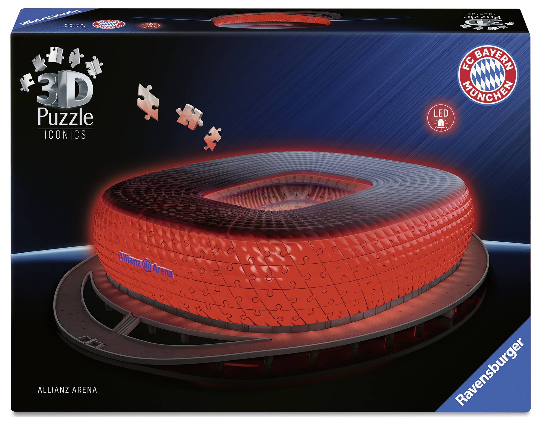 De afbeelding toont een 3D-puzzel van de Allianz Arena in rode verlichting, met logo's van FC Bayern München en Ravensburger.