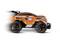Een oranje speelgoedauto met de tekst 'Gear Monster' rijdt snel naar links. Het heeft grote banden en een futuristische stijl.
