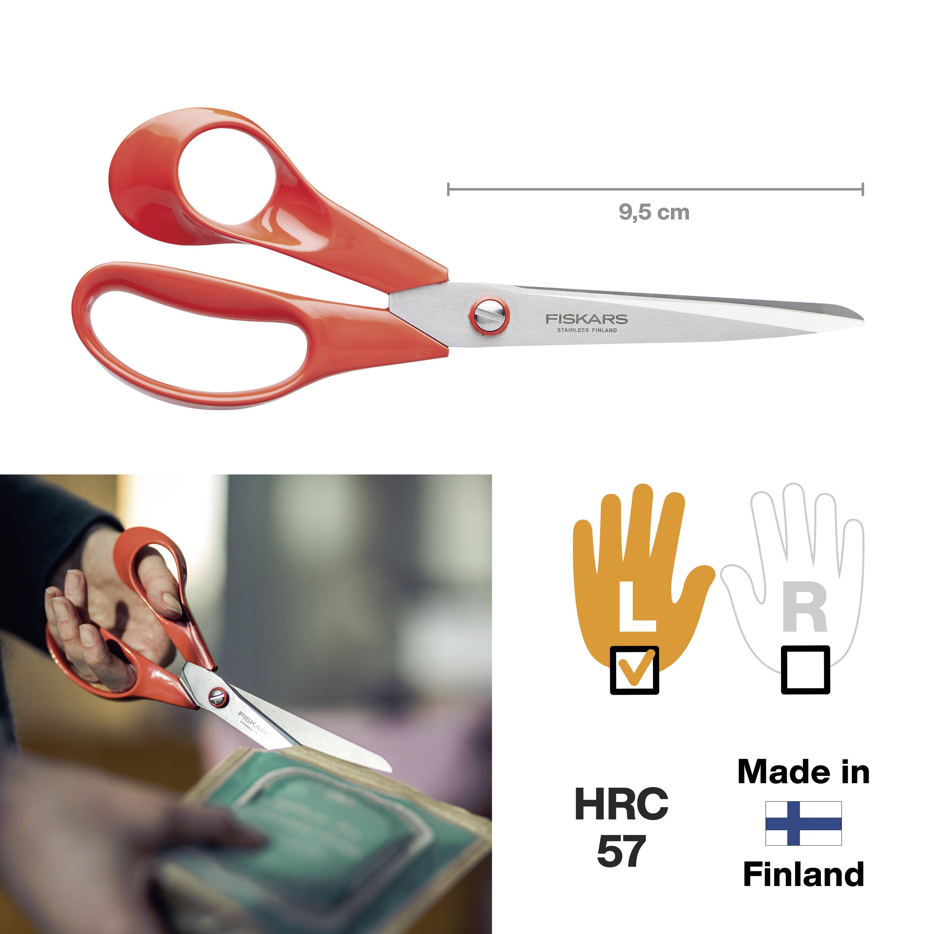 Rode Fiskars-schaar met oranje handvat, lengte 9,5 cm, geschikt voor rechts- en linkshandigen, hardheid HRC 57, vervaardigd in Finland.