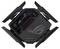 Een zwarte router met een futuristisch design, rode ventilatiesleufjes en een ROG-logo in het midden.