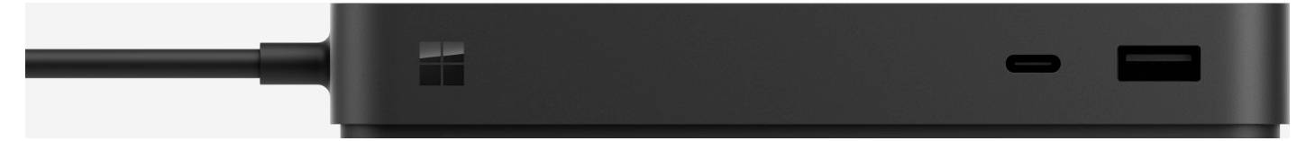 Een zwart dockingstation met meerdere aansluitingen, waaronder een HDMI- en USB-C-aansluiting aan de rechterkant.