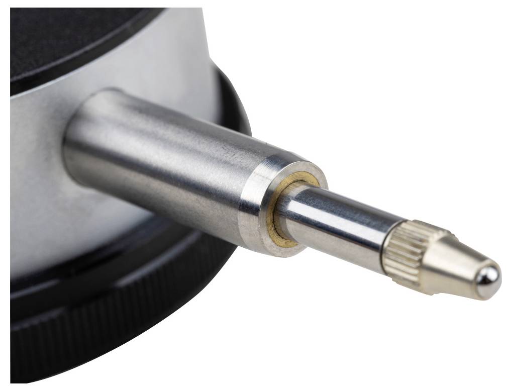 Een close-upfoto van een precisie-mechanisch instrument met een cilindrische metalen behuizing en een puntige tip, waarschijnlijk gebruikt voor metingen.