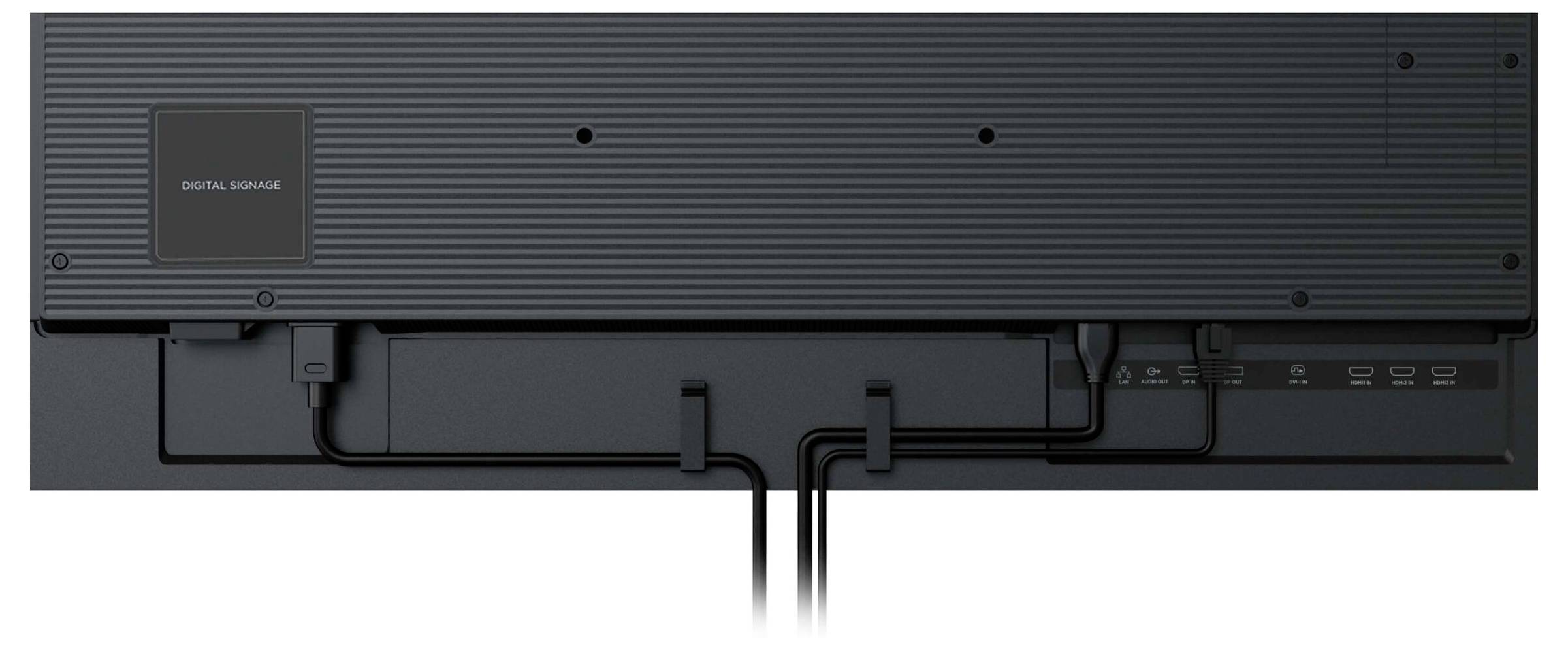 Een zwart, rechthoekig digitaal signaleringsapparaat bekeken van achteren, waarbij de kabelaansluitingen en poorten zichtbaar zijn, met een geribde textuur.