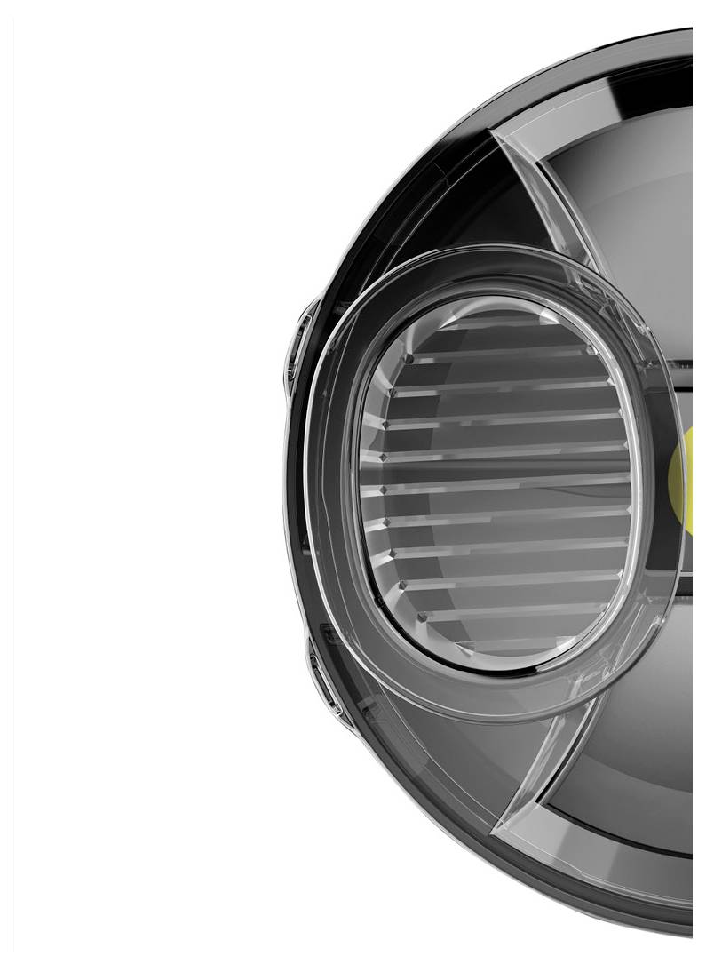 Close-up van een strak, modern autokoplamp, met een heldere lens, reflecterende oppervlakken en geraffineerde interne componenten.