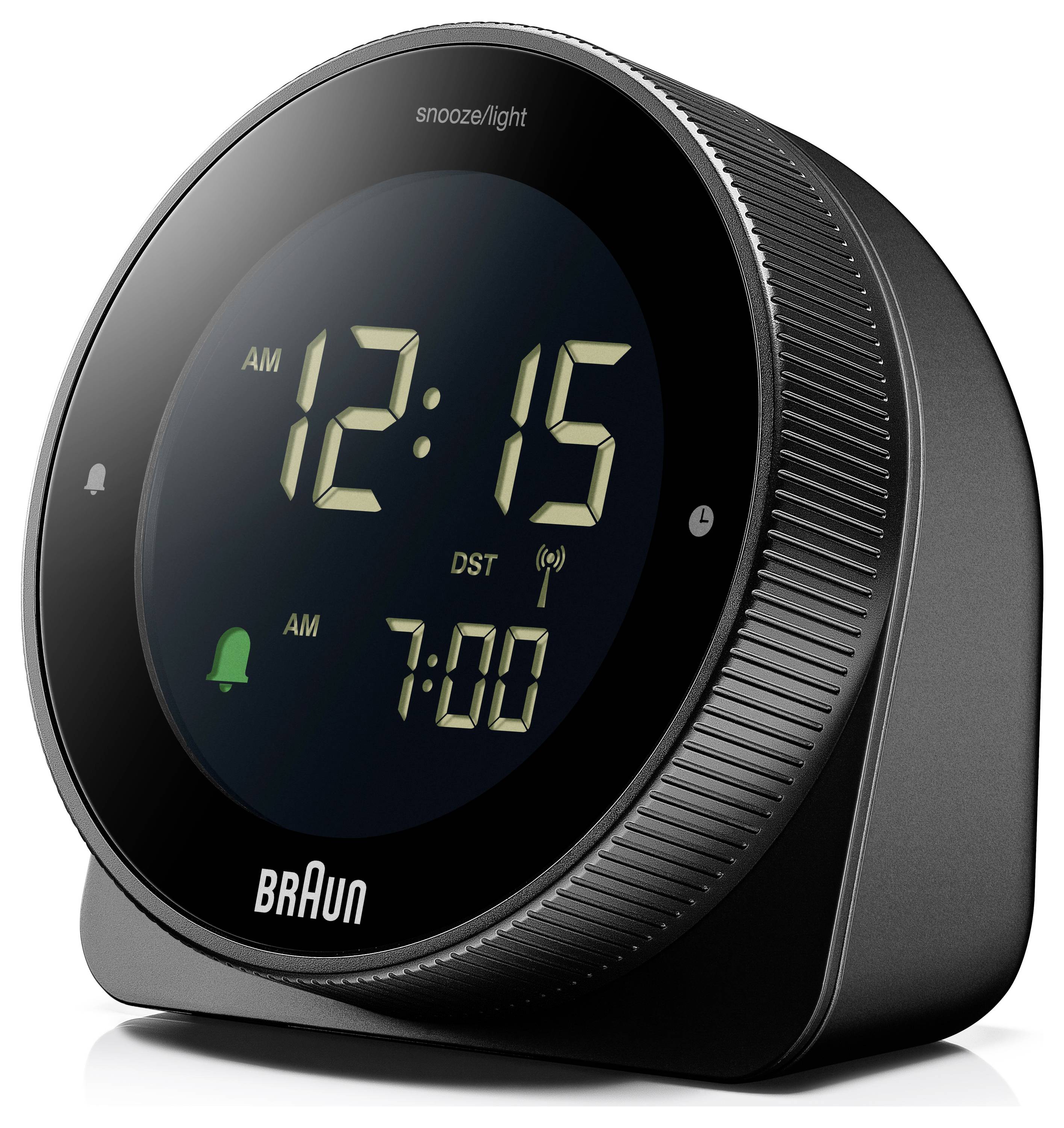 Een digitale wekker die '12:15 's nachts' aangeeft, met een alarm ingesteld op '7:00 's ochtends'. Hij heeft een minimalistische vormgeving met een zwarte behuizing en een led-display.