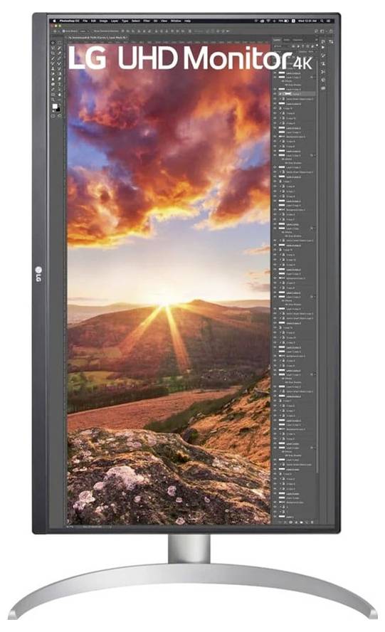 Verticale LG UHD-monitor die fotobewerkingssoftware weergeeft, met een levendige zonsondergang boven een berglandschap.