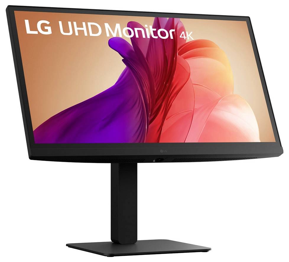 LG UHD-monitor 4K met een levendige paarse en rode abstracte achtergrond op het scherm, weergegeven op een gekantelde standaard.