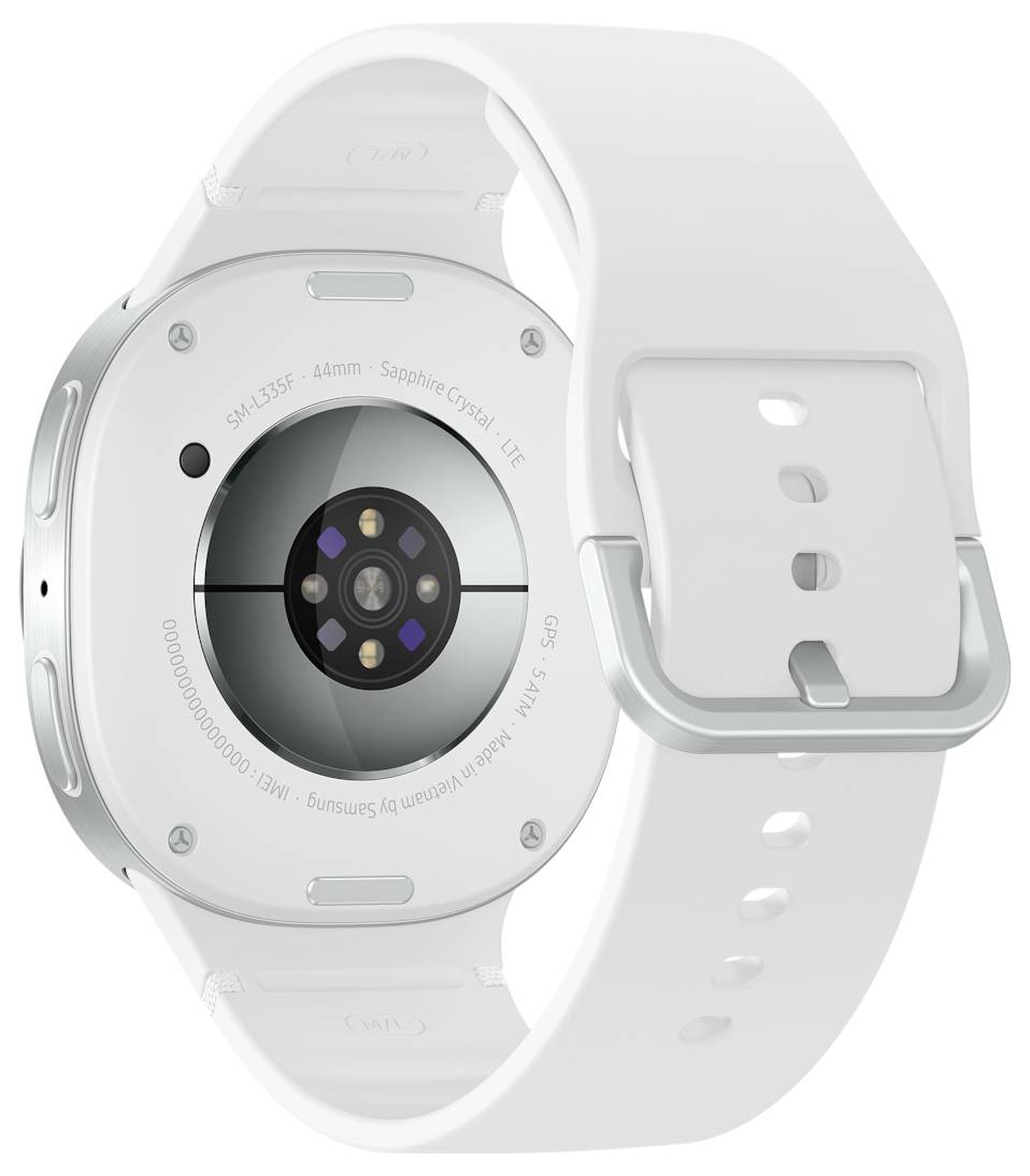 De afbeelding toont de achterkant van een witte smartwatch met een ronde sensor in het midden, met details zoals '44mm, Saffierglas, LTE'.