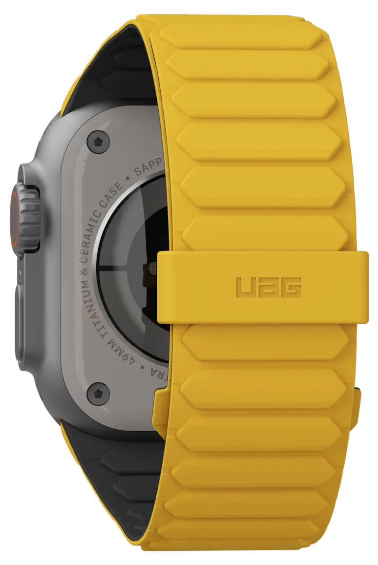 Een smartwatch met een grijze behuizing en een felgele band, waarbij 'UAG' op de band staat, dat een robuust en sportief ontwerp tentoonspreid.