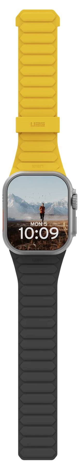 Smartwatch met een digitaal scherm waarop '10:09' wordt weergegeven en een buitenwallpaper met bergen. Het heeft verwisselbare gele en zwarte bandjes.