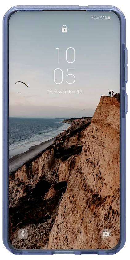 Smartphone met een afbeelding van een uitzicht op een klif, waarop twee personen aan de rand staan en een parasailer in de lucht te zien is.