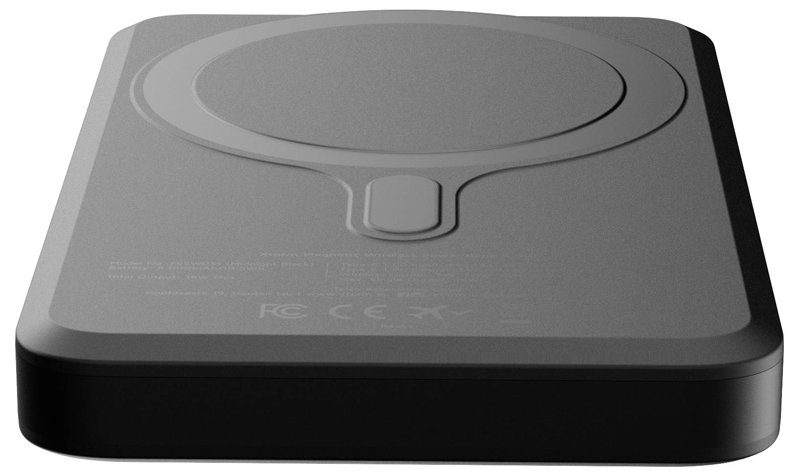 Een platte, rechthoekige zwarte magnetische oplaadmat met een cirkelvormig patroon op het oppervlak, ontworpen voor het draadloos opladen van compatibele apparaten.