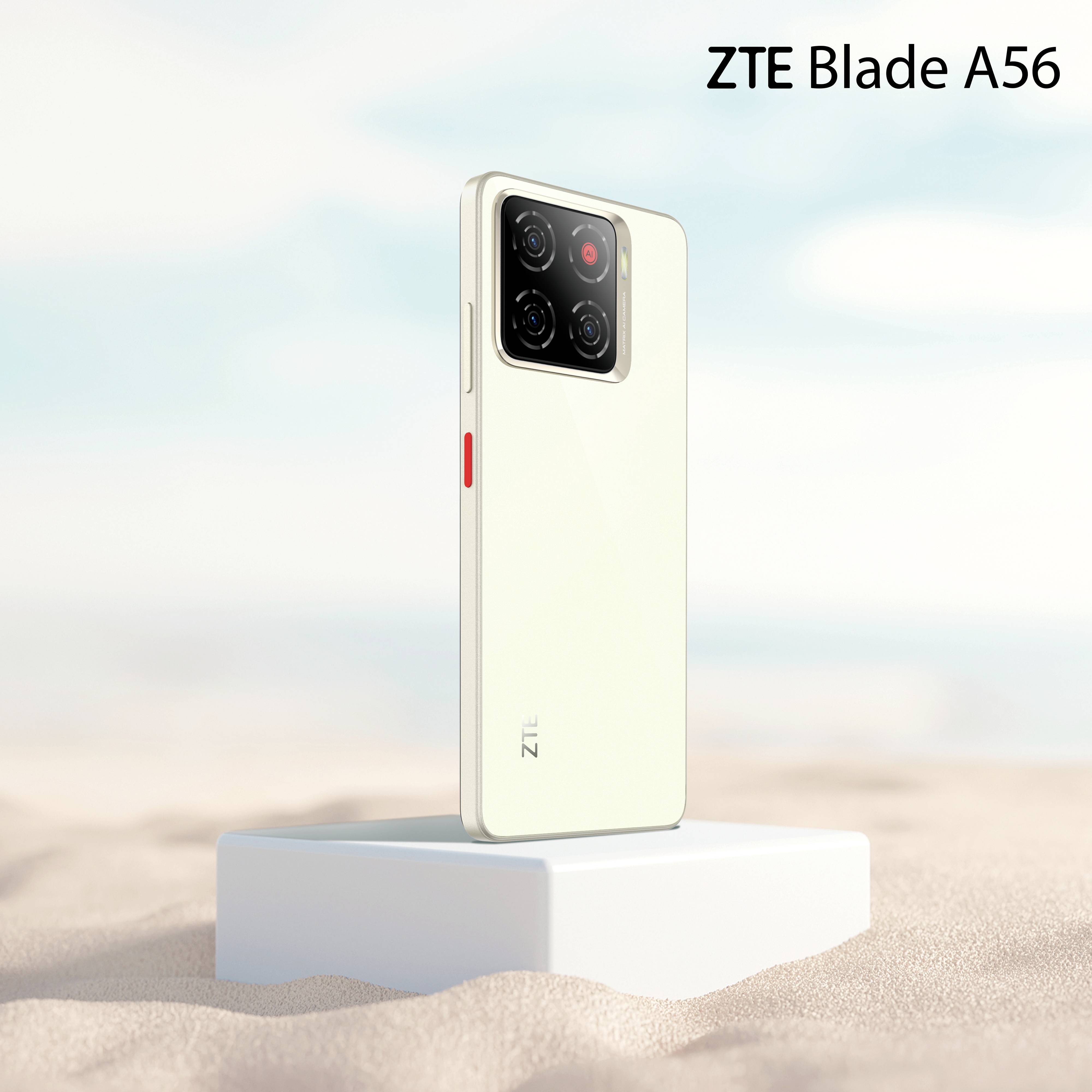 Een witte smartphone met drie camera's aan de achterkant, rechtop weergegeven op een zandachtige ondergrond. De tekst 'ZTE Blade A56' is zichtbaar in de rechterbovenhoek.