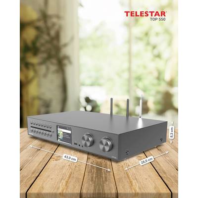 Grijze audioapparatuur 'TELESTAR TOP 550' op houten tafel. Afmetingen: 43 cm breed, 28 cm diep, 8,3 cm hoog. Achtergrond onscherp.