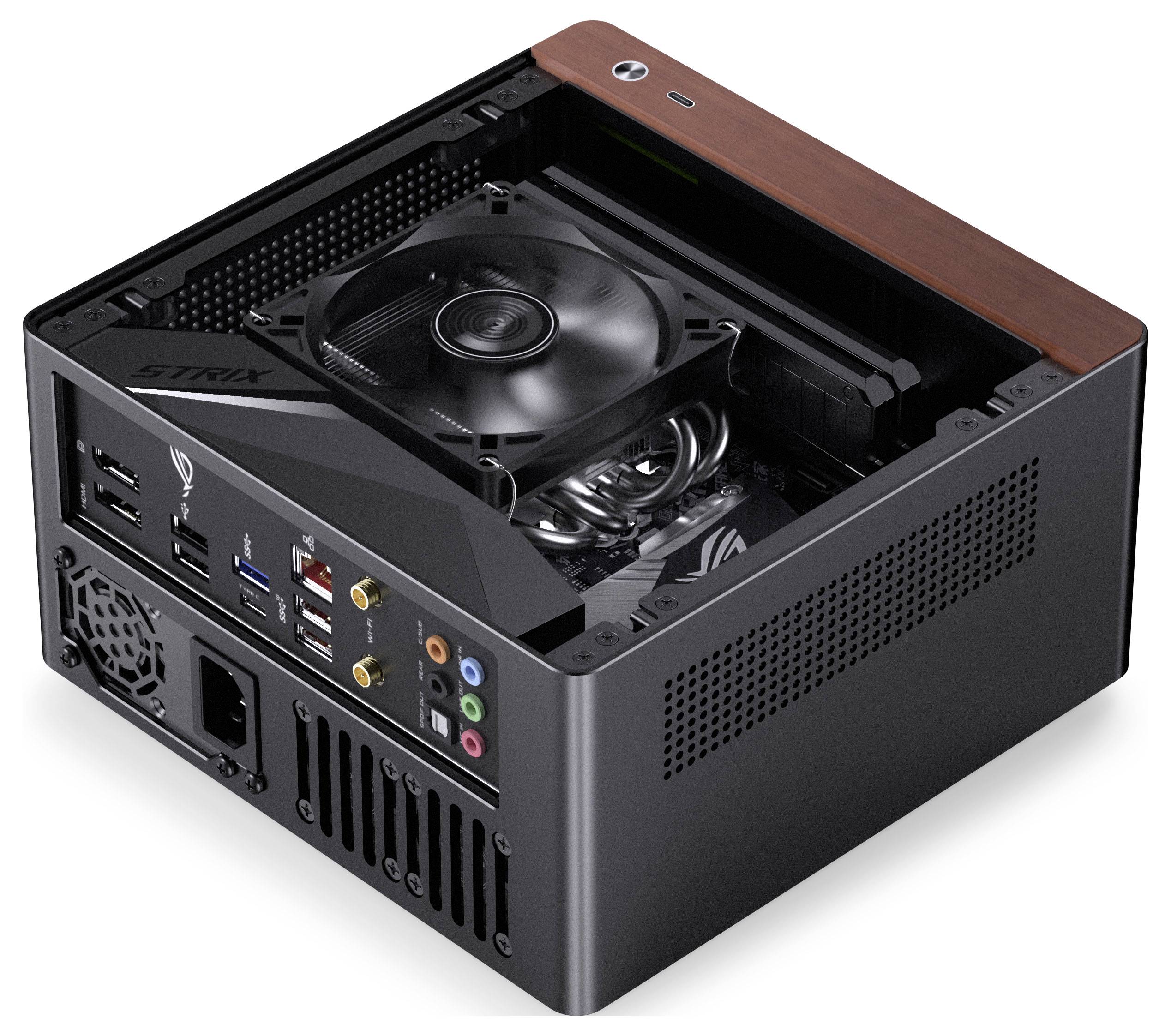 Een compacte zwarte computerbehuizing met een bovenaan geplaatste koelventilator, meerdere poorten aan de achterkant waaronder USB en audio-ingangen, en een zichtbaar moederbord.
