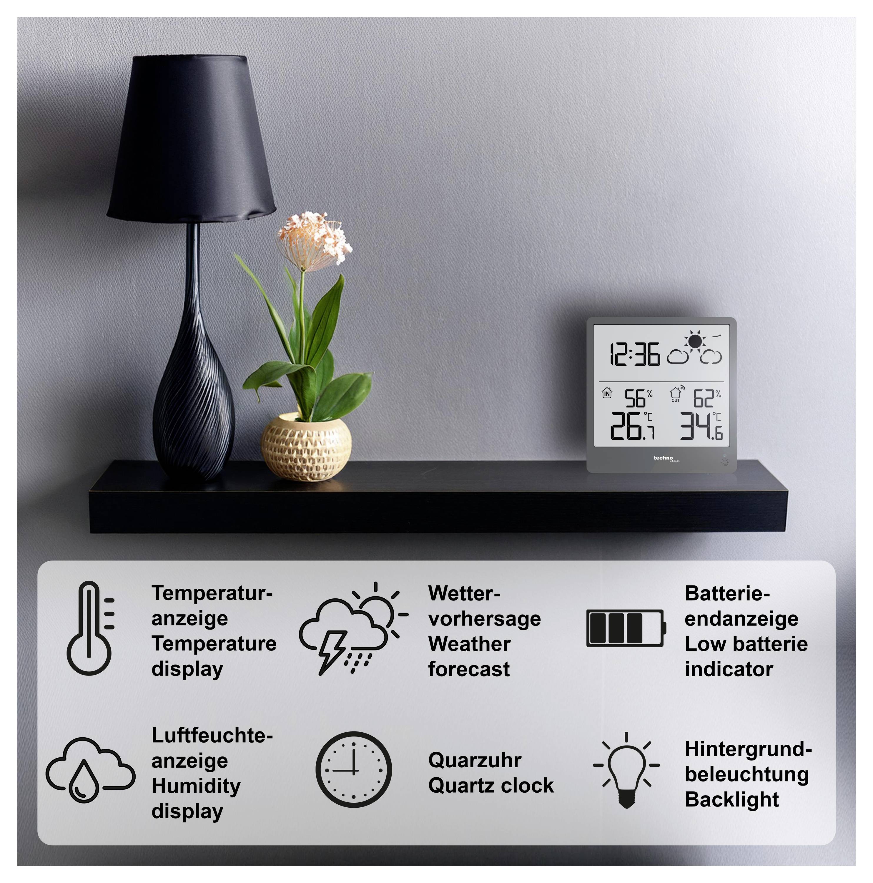 Een digitale klok op een plank toont tijd en weer; pictogrammen daaronder geven functies aan: temperatuur, voorspelling, vochtigheid, batterij, klok, achtergrondverlichting.