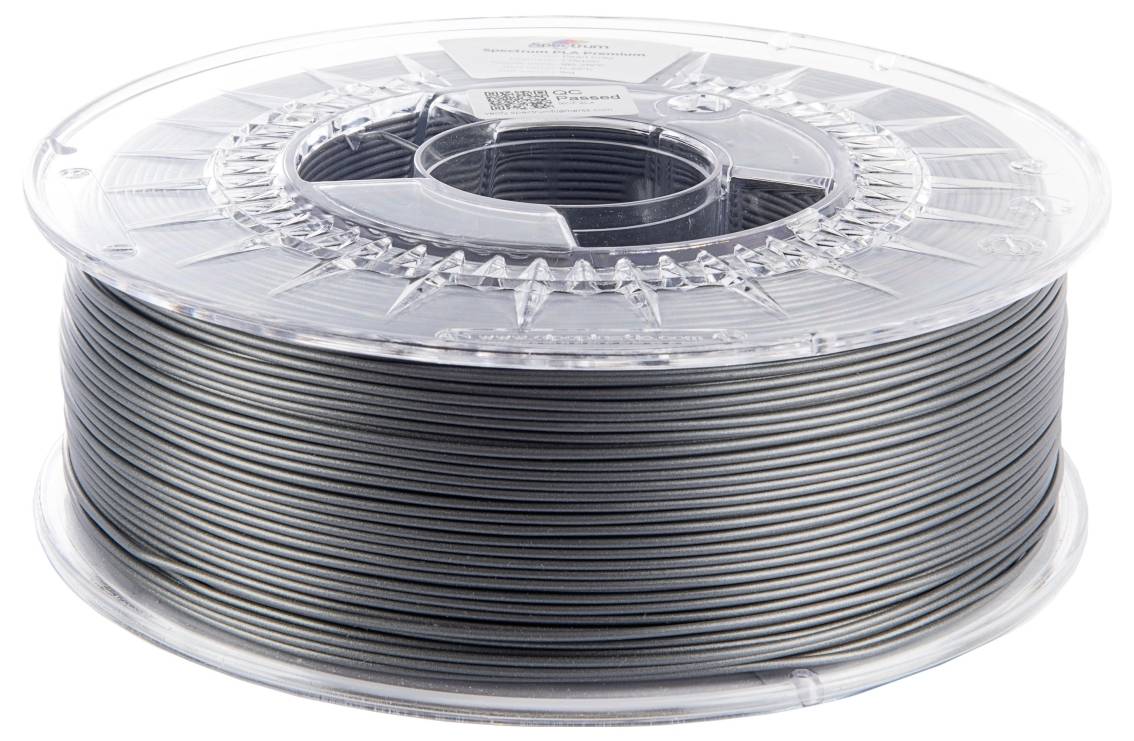 Een spoel grijs 3D-printerfilament op een transparante kunststof spoel, waarbij strak gewikkelde lagen filament klaar voor gebruik zichtbaar zijn.