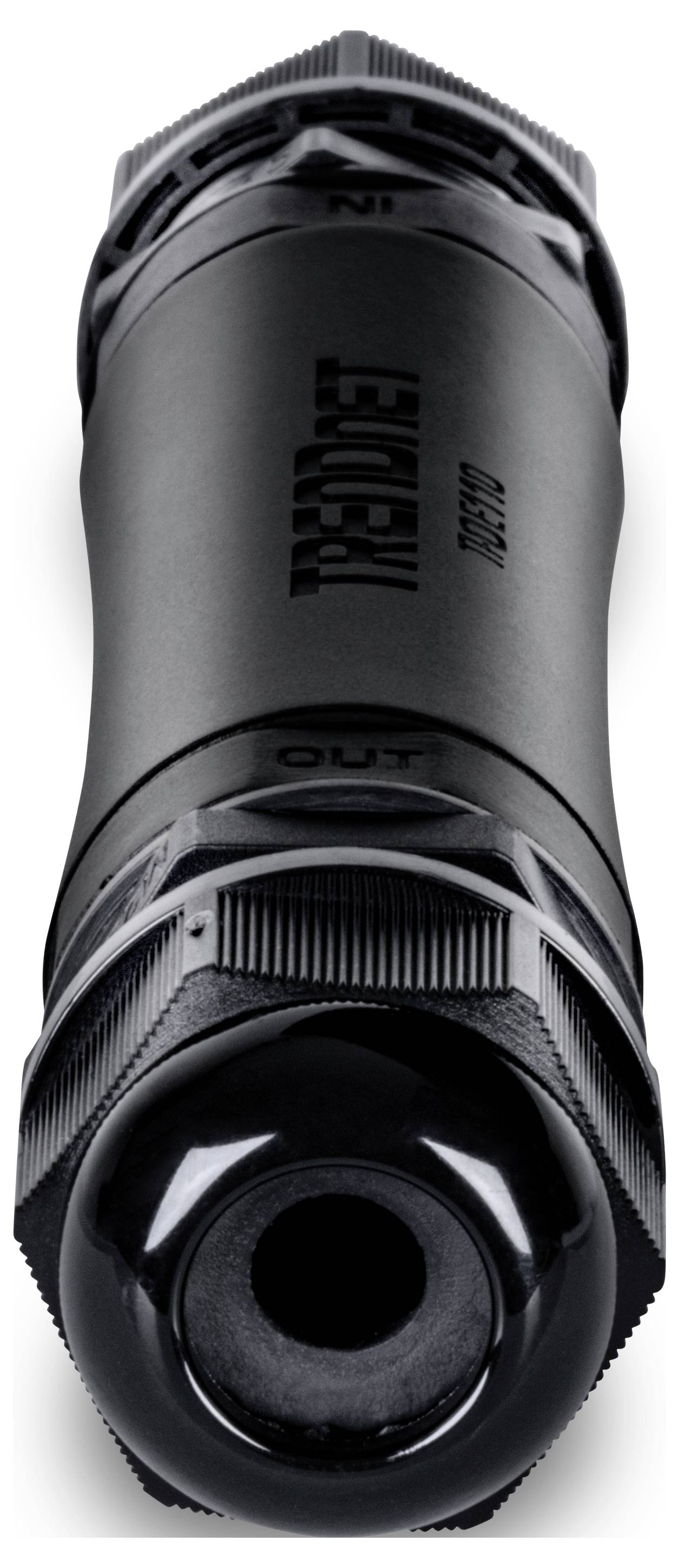 Een close-up van een zwarte cilindervormige apparaat met de woorden 'IN' en 'OUT' op zijn behuizing, met een ronde opening aan een kant.