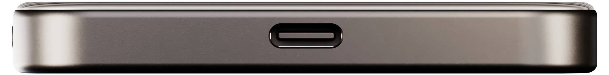 Een close-upfoto van een poort van een apparaat, waarschijnlijk een USB-C oplaadpoort, met een metalen afwerking en compacte vormgeving.