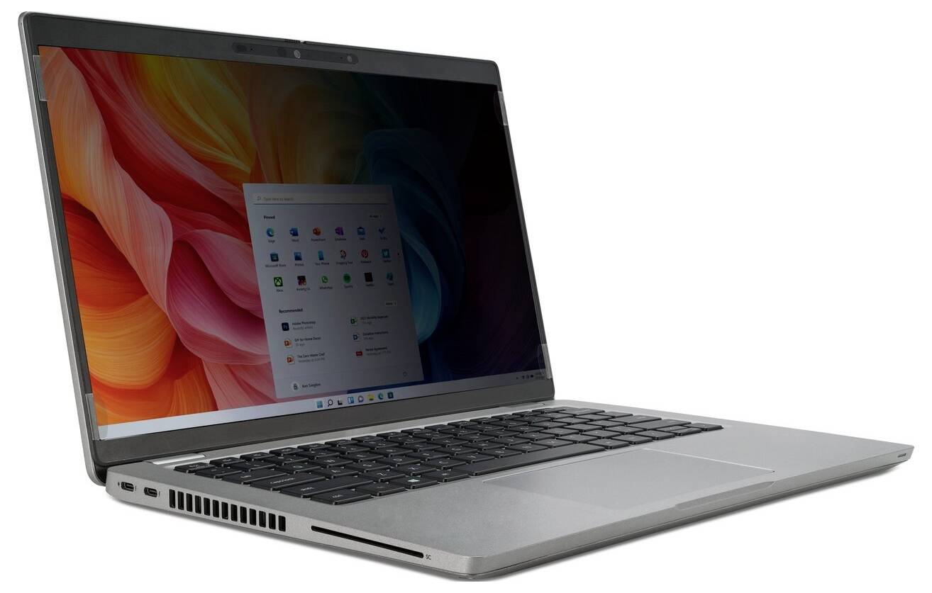 Een zilveren laptop met een open scherm dat een kleurrijke abstracte achtergrond vertoont en een menu met applicatie-pictogrammen in een rasterindeling.