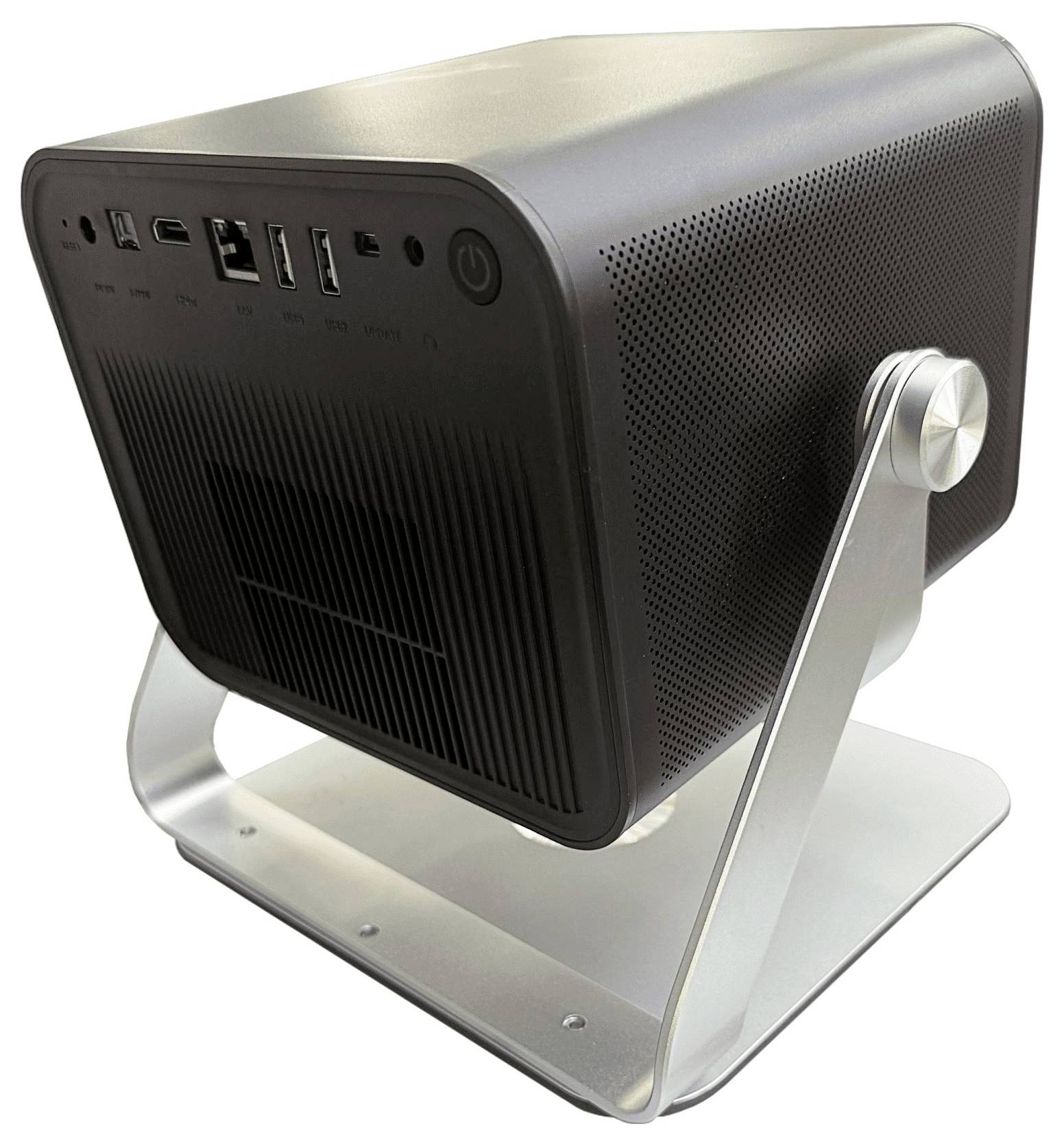 Een zwart, rechthoekig elektronisch apparaat op een metalen standaard, met meerdere poorten en knoppen op het voorpaneel, dat lijkt op een mini-projector.