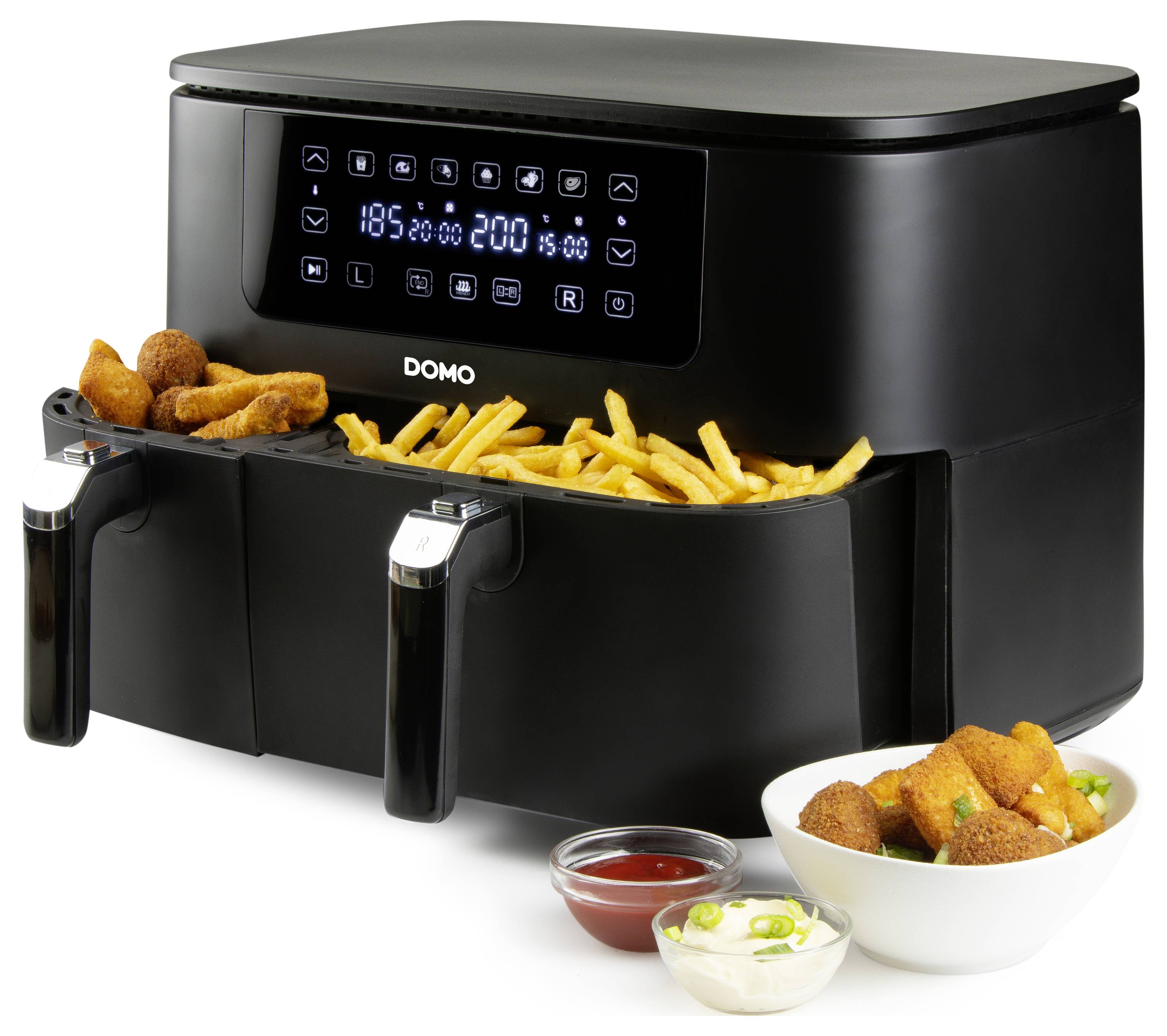Een zwarte airfryer met twee manden, met een digitaal display ingesteld op 185°C. De manden bevatten friet en kip, met sauzen aan de zijkant.