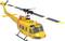 Een gele reddingshelikopter met een onderscheidend rotordesign, gemarkeerd met 'Rescue' en emblemen, gezien vanaf de zijkant op een witte achtergrond.