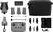 Drone en toebehoren: drone-behuizing, afstandsbediening, drie batterijen, oplaadstation, draagtas, propellerbladen en filters.