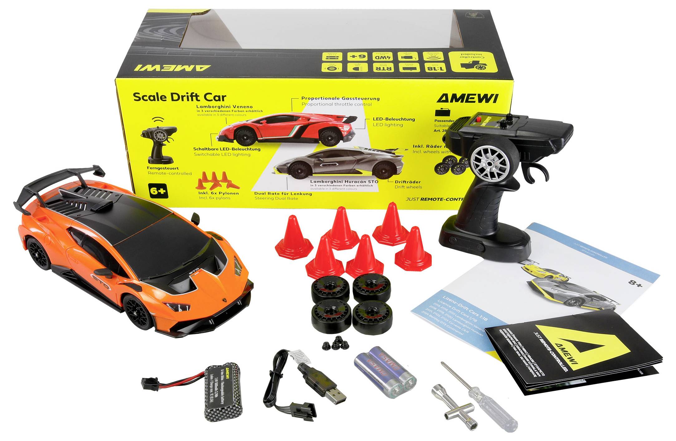 RC drift auto set bevat een oranje speelgoedauto, afstandsbediening, vier extra banden, rode kegels, batterijen, oplaadkabel, schroevendraaier en handleidingen.