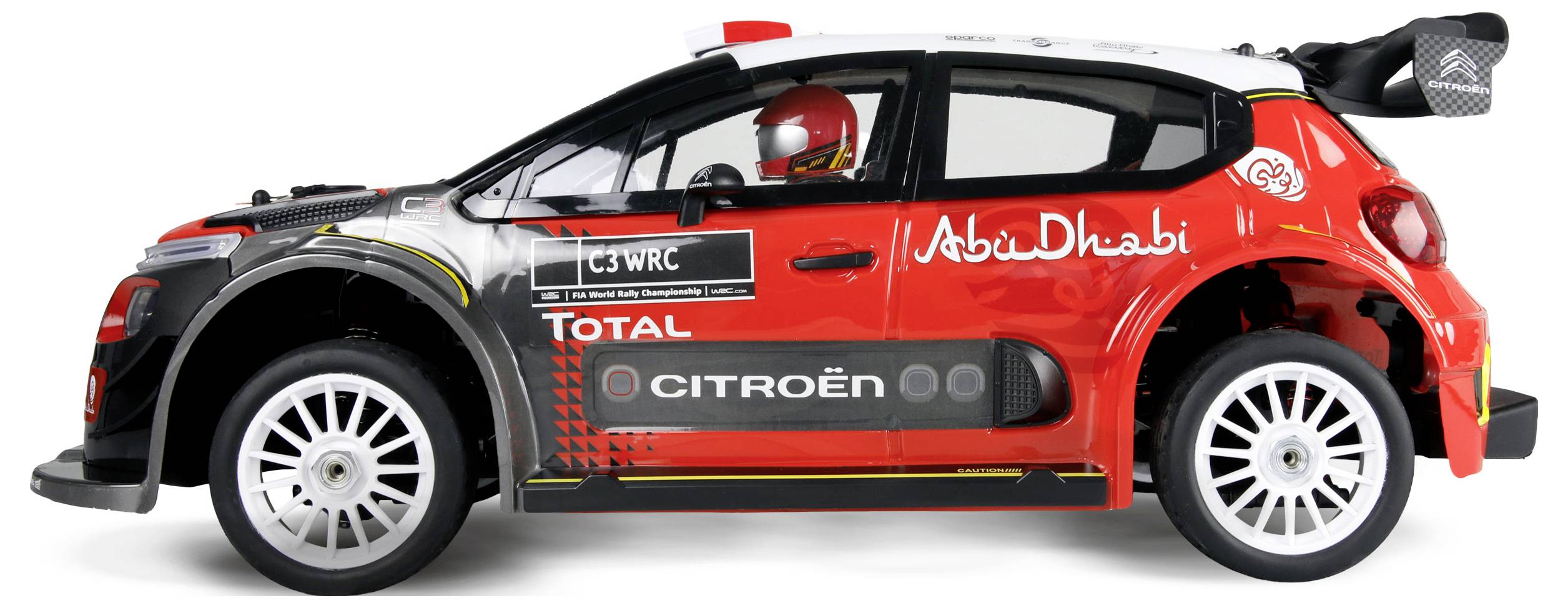 Een speelgoed rallywagen model in rood, zwart en wit met een bestuurder met een helm. Het heeft sponsorlogo's, waaronder 'Abu Dhabi' en 'Total'.