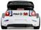 Racewagen achteraanzicht met 'RALLYTHEWORLD.com' en 'Volkswagen Financial Services' op de spoiler, 'Wales' kentekenplaat en rood drakenlogo.