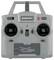 Een grijze helikopter afstandsbediening met twee joysticks, voorzien van het label 'AMEWI', beschikt over schakelaars voor 'Opstijgen' en 'Landen' en een 'Stop'-knop.