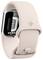 Een beige fitnesstracker met een hartslagmeter, bevestigd op een band, die zijn strakke design en technologische eigenschappen laat zien.