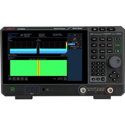 Een signaalanalyzer die een frequentiespectrum toont met een duidelijke piek in het midden. Bedieningsknoppen en draaiknoppen bevinden zich aan de rechterkant.